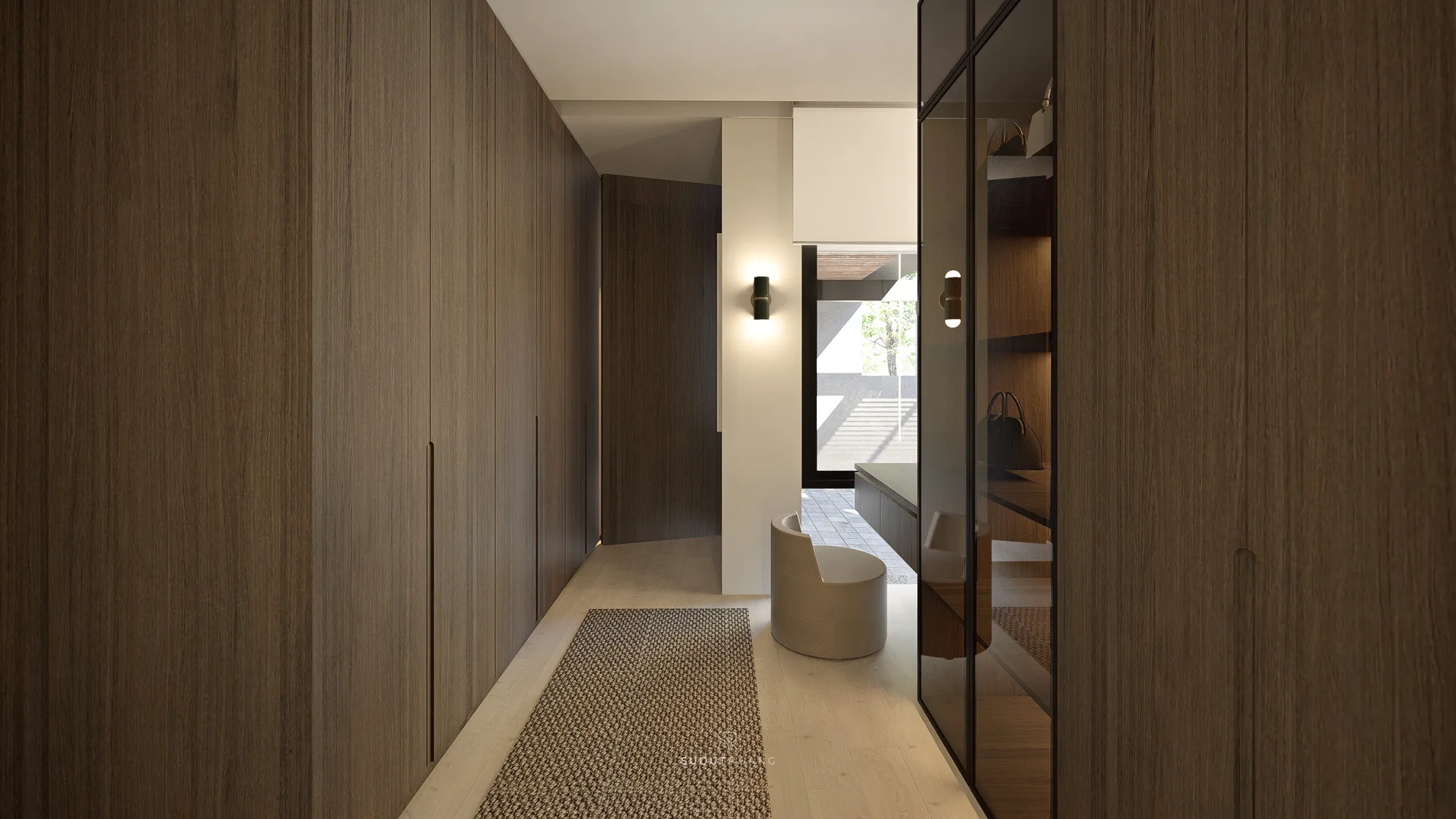 Looking back down the wardrobe corridor toward the entry, its wood-slat door and window seat visible past a woven runner and glass display case.