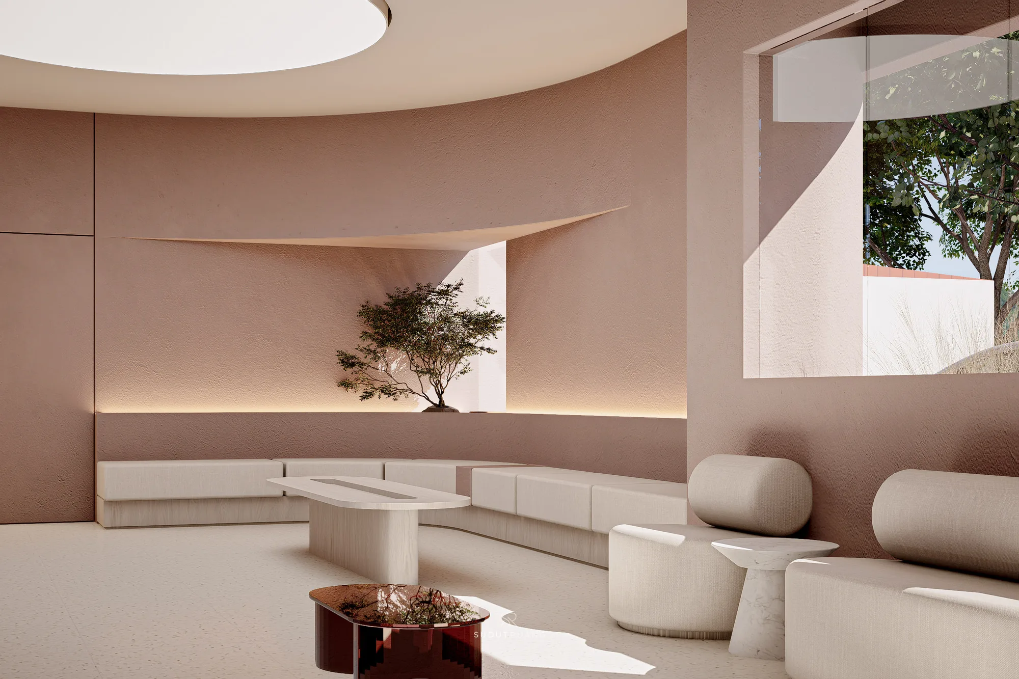 The same tree alcove seen wider, Beauty Center's curved bench wrapping the lounge beneath a window onto the street grasses outside.