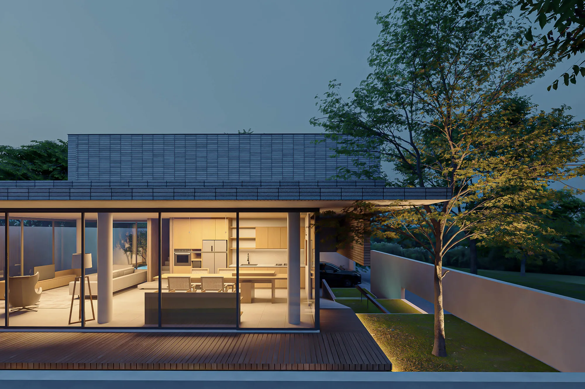 Dusk exterior of the two-story house, its kitchen and dining area glowing behind full-height glass beside a parked car.