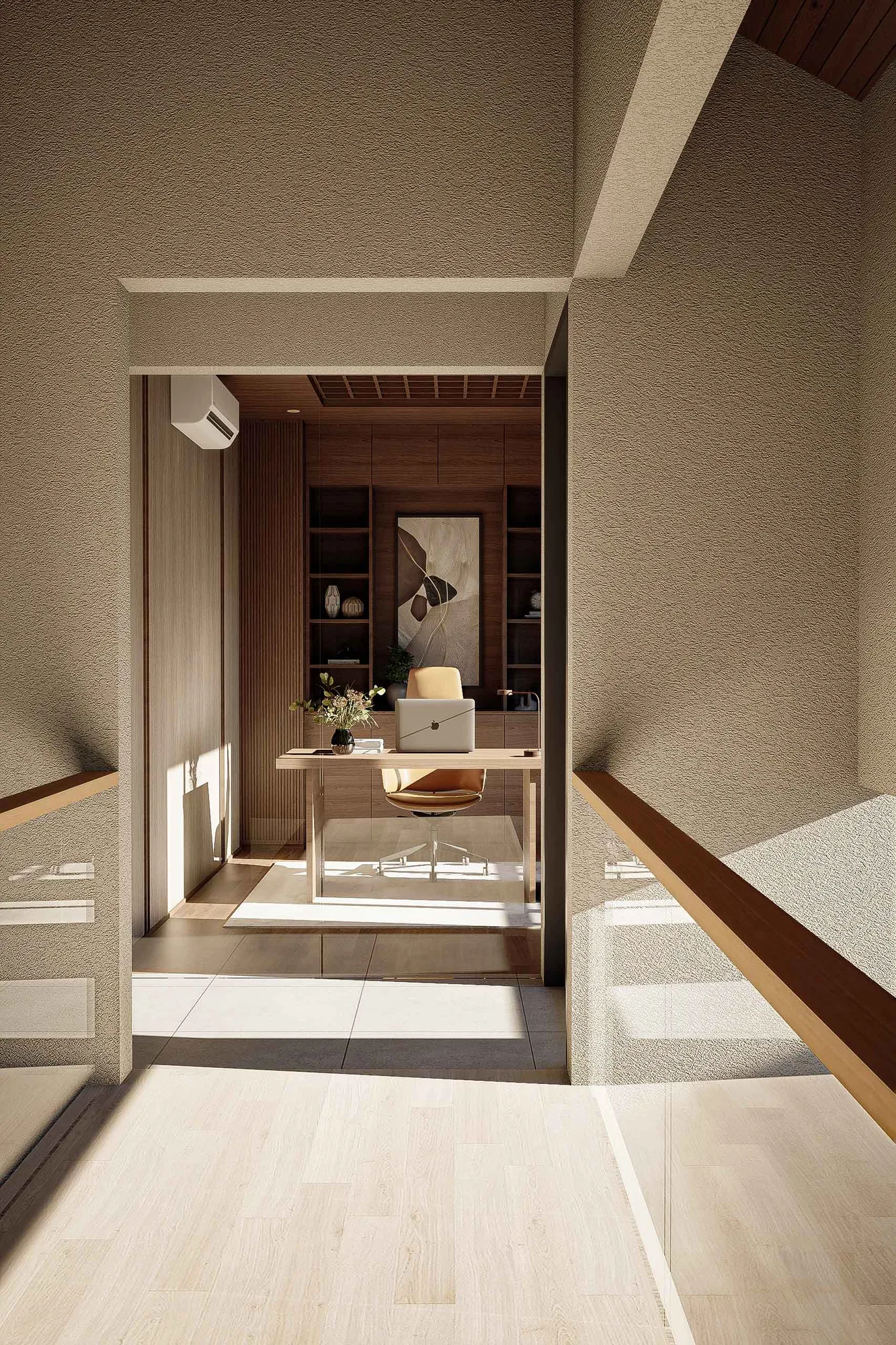 Home office glimpsed through a doorway, a walnut desk and leather chair facing built-in shelving and a framed artwork.