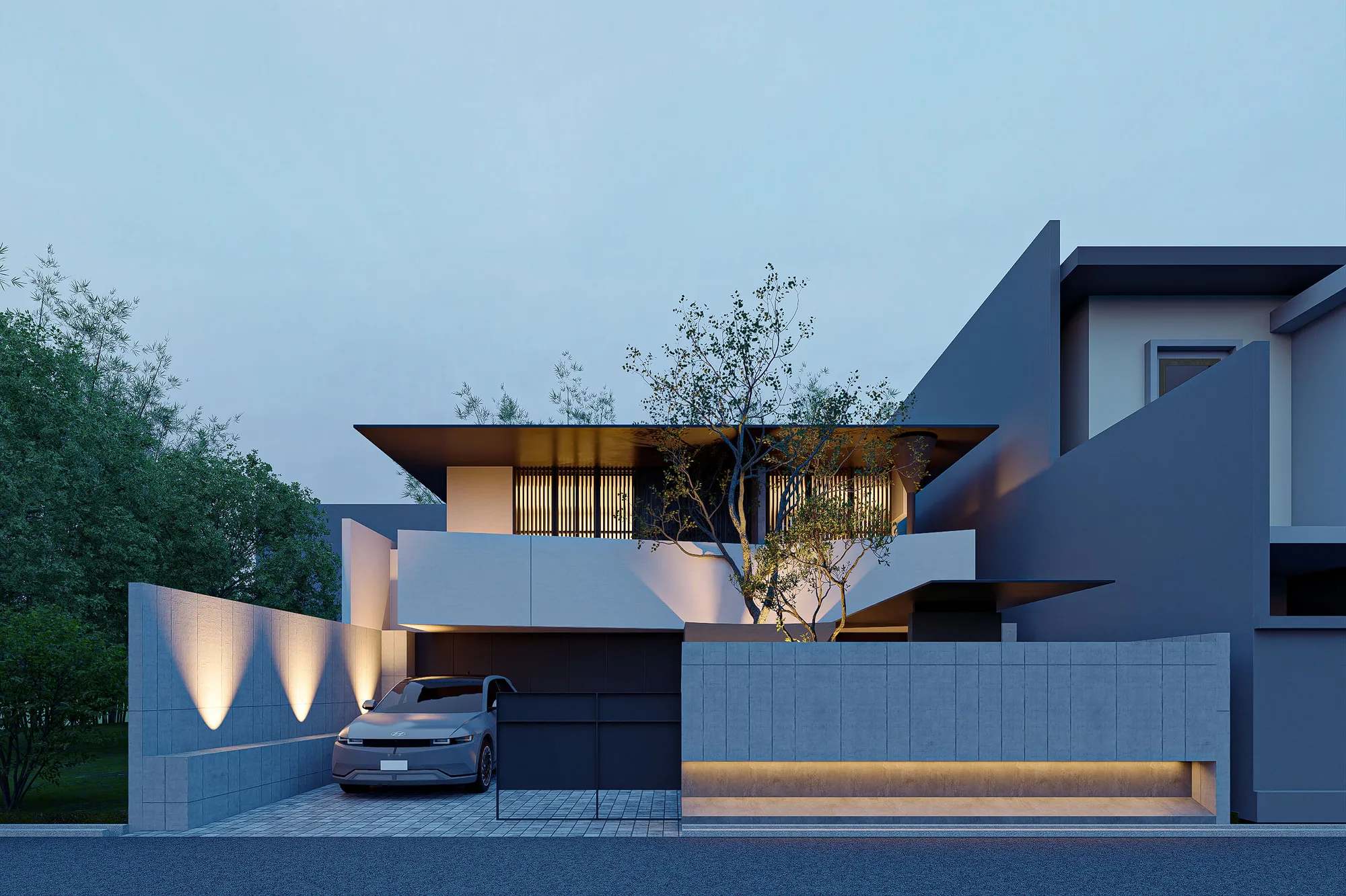 The same street facade of FS House at dusk, uplights grazing the concrete-block fence as the timber screen glows from within.