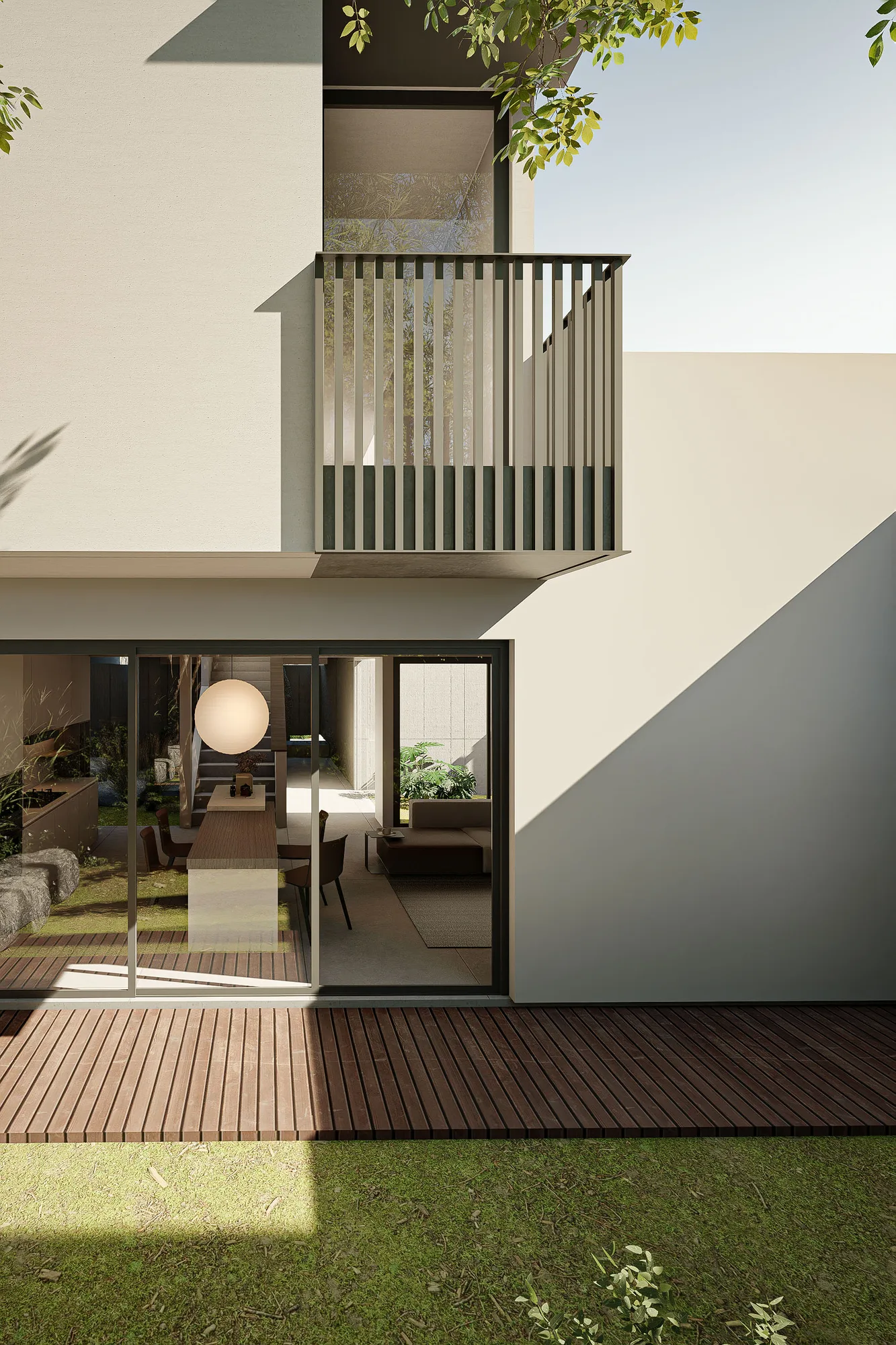 Rear elevation at dusk, the timber-slat balcony and glowing dining room overlooking the wood-decked garden.