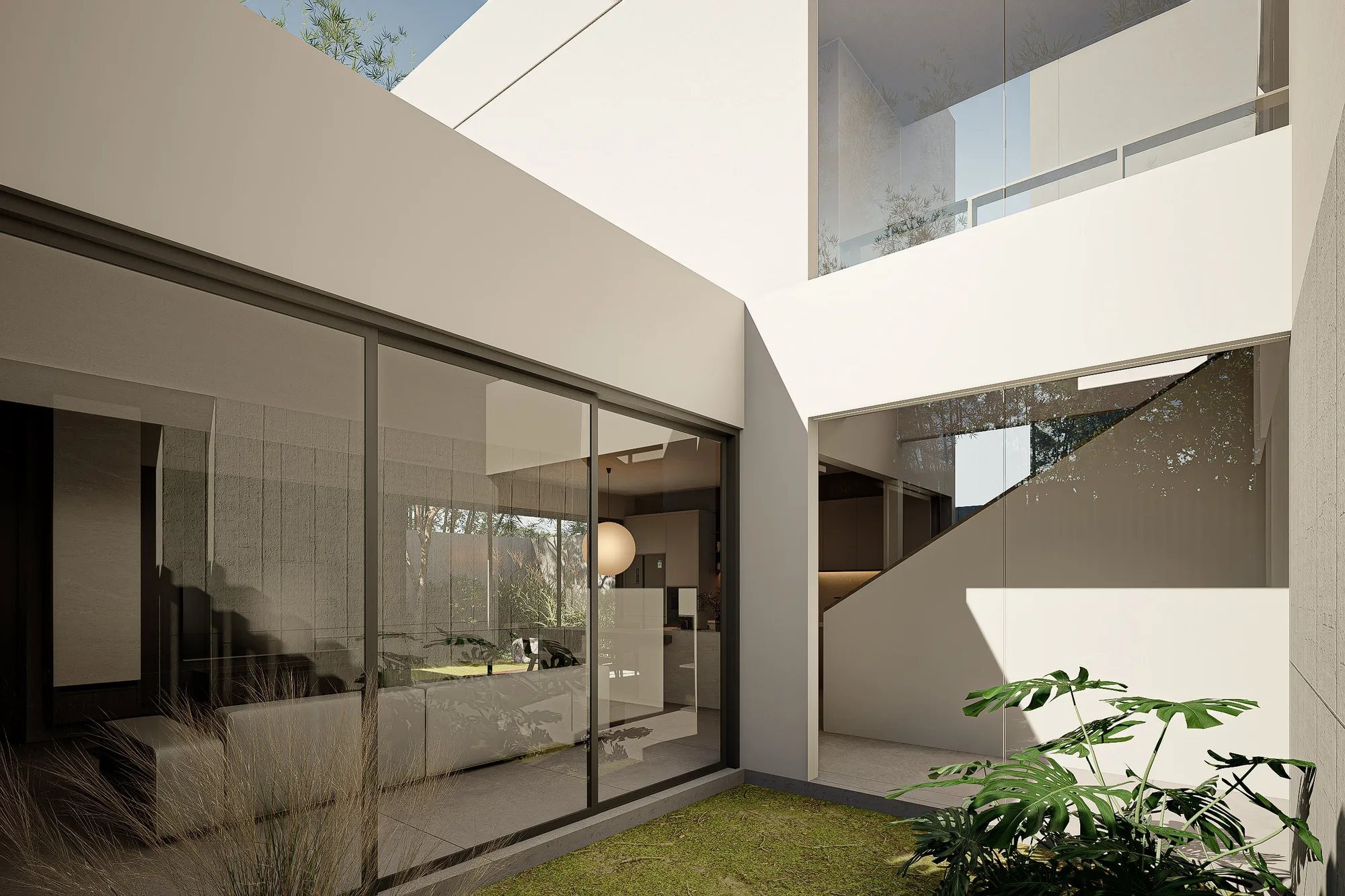 Interior courtyard seen through the double-height glazing, staircase and second courtyard visible beyond.
