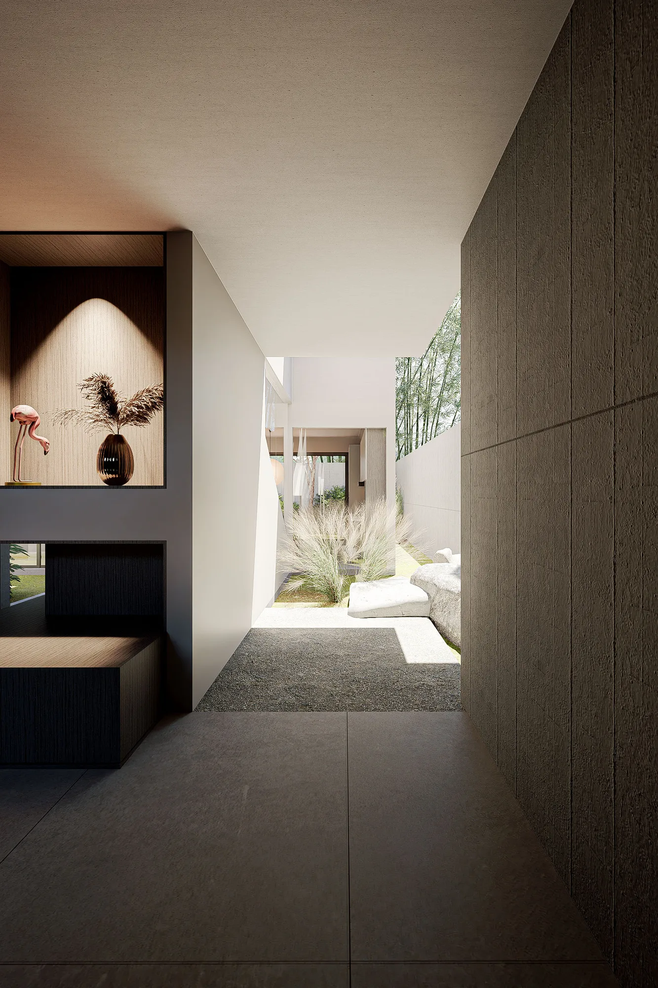 Concrete-paved passage leading past a display niche toward the rear garden with pampas grass and boulders.
