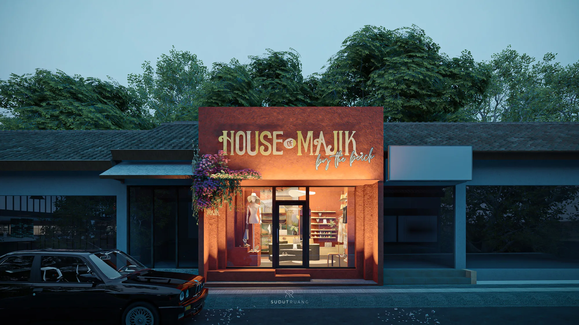 House of Majik's terracotta facade lit warm at dusk, gold signage glowing above a flower-draped entrance and a sunhat-wearing mannequin in the window.