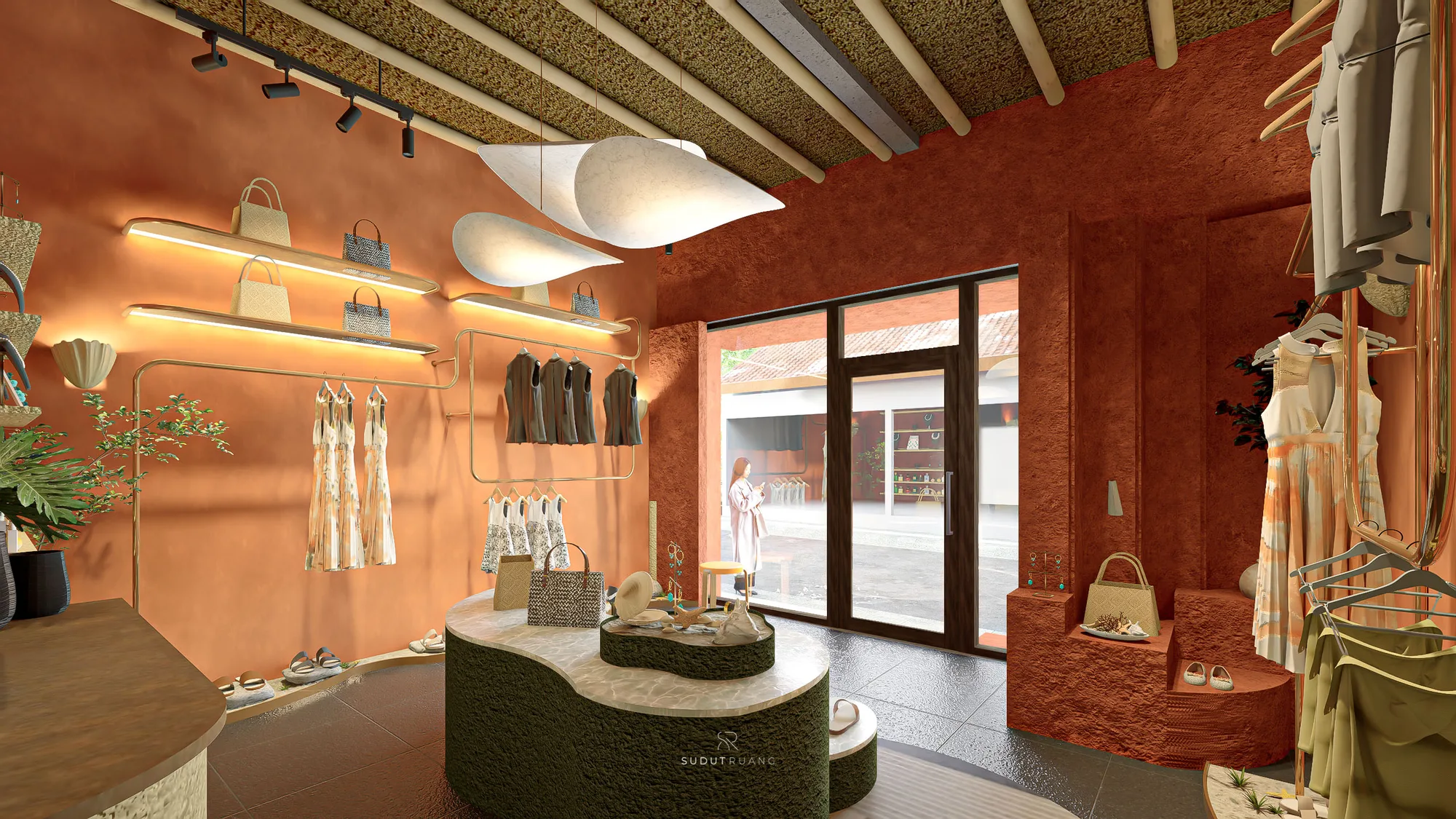 House of Majik's cylindrical fitting room framed by pale green curtains, its terracotta interior fitted with a shell-shaped wall sconce and hooks.