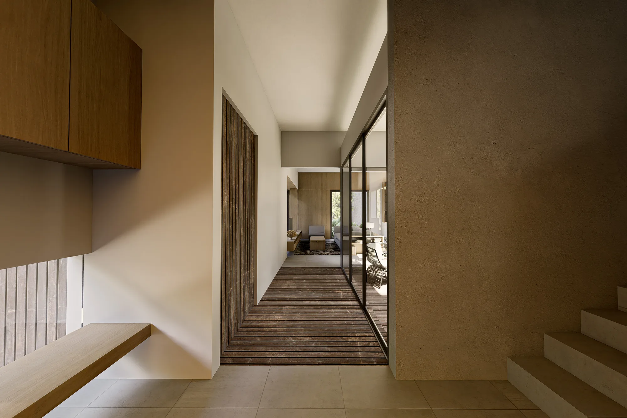 Entry hallway with a wall-mounted bench and dark timber slat flooring leading toward the living room's glass partition.