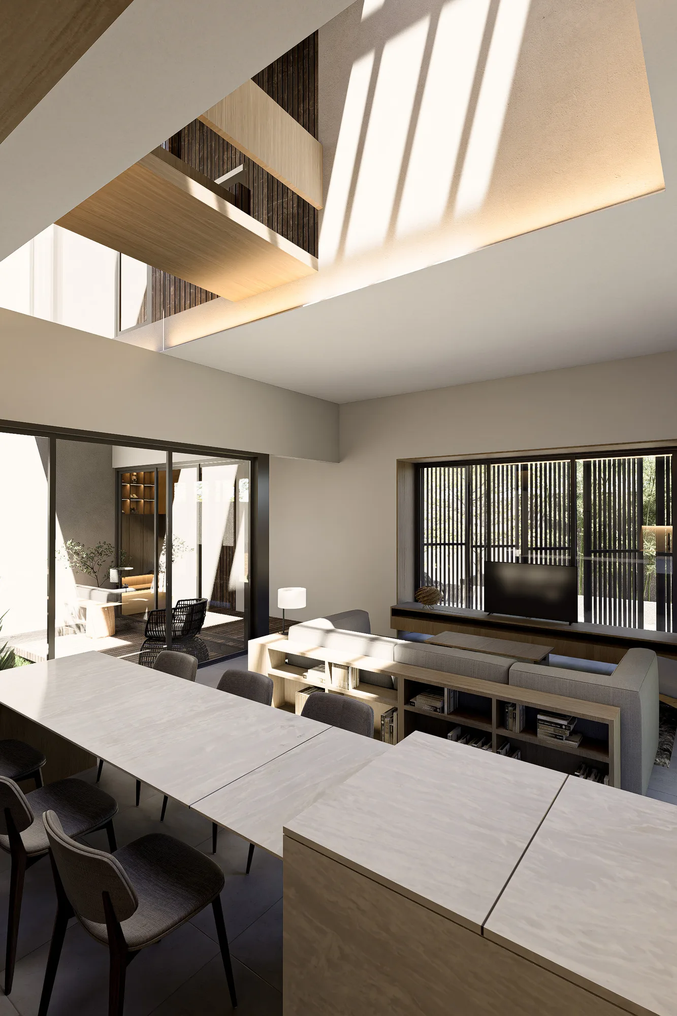 Dining table set beneath a double-height void, with the living room's bookshelf and sofa visible past a slatted screen.