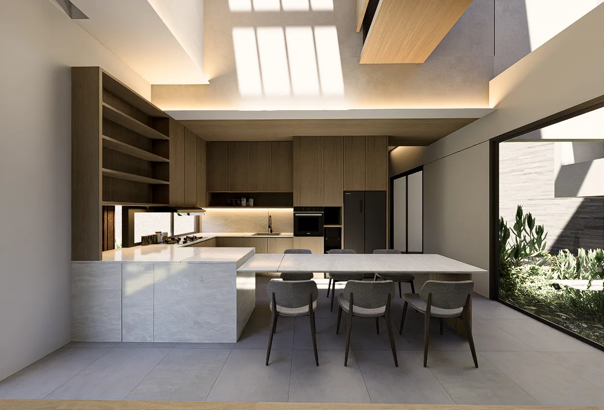 Open kitchen in oak veneer with an integrated fridge and a marble island extending into the dining table.