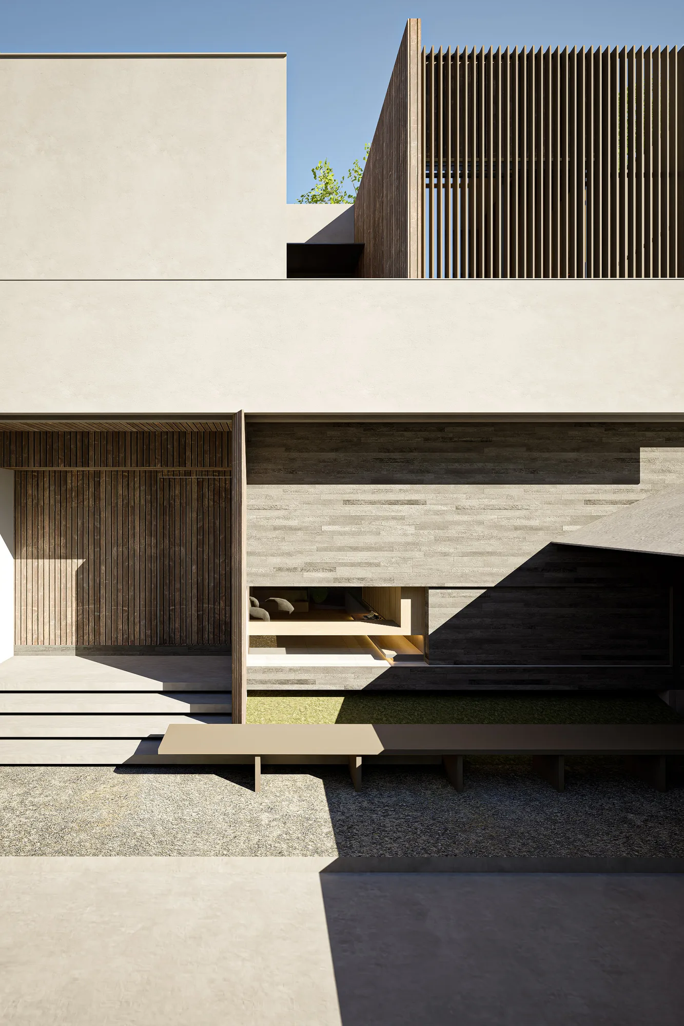 Detail of the split-level facade where a stone-clad living room opens beneath overlapping timber and render volumes.