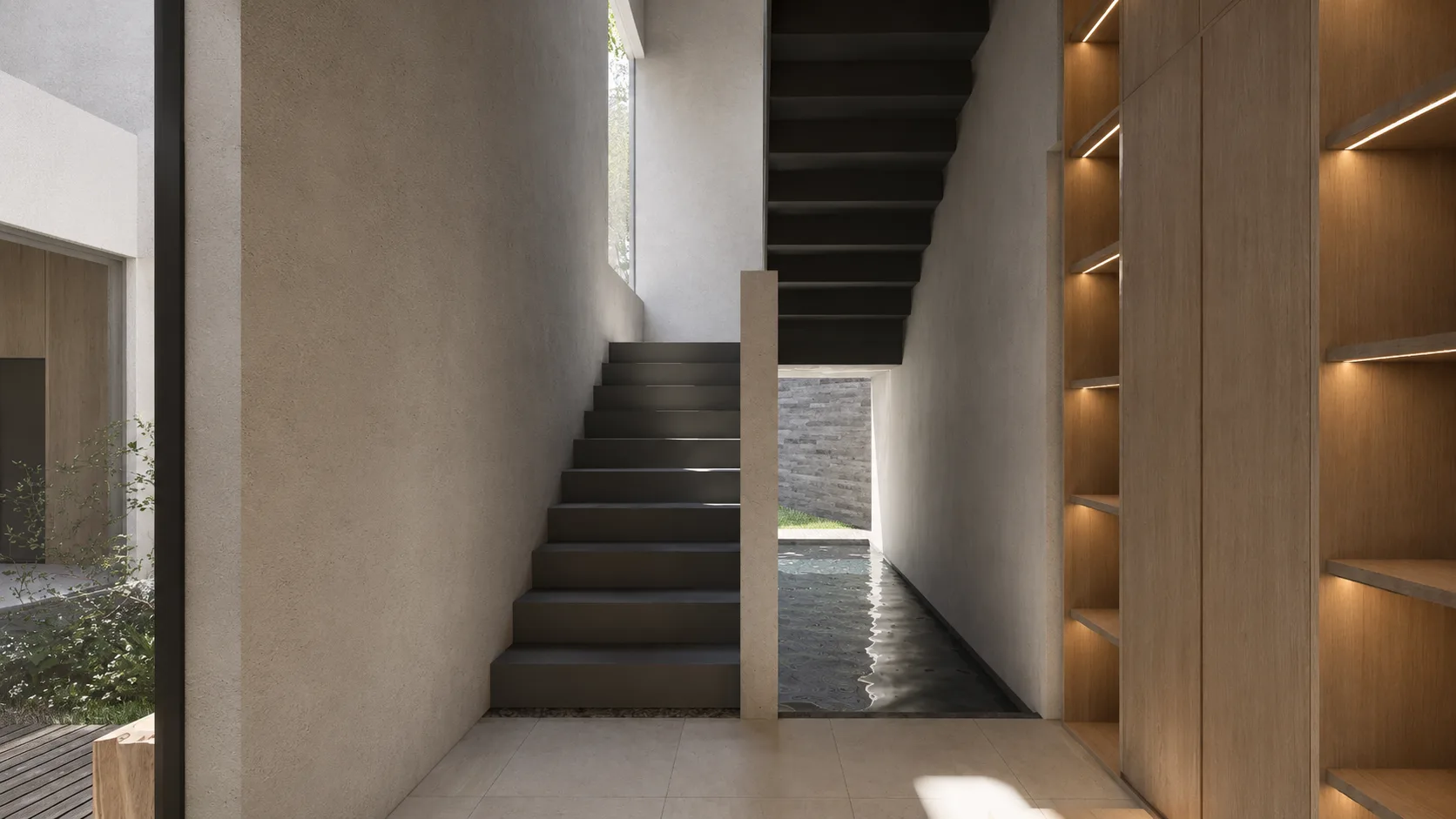 Concrete stair beside a narrow reflecting pool, built-in shelving lit from beneath along the adjacent wall.