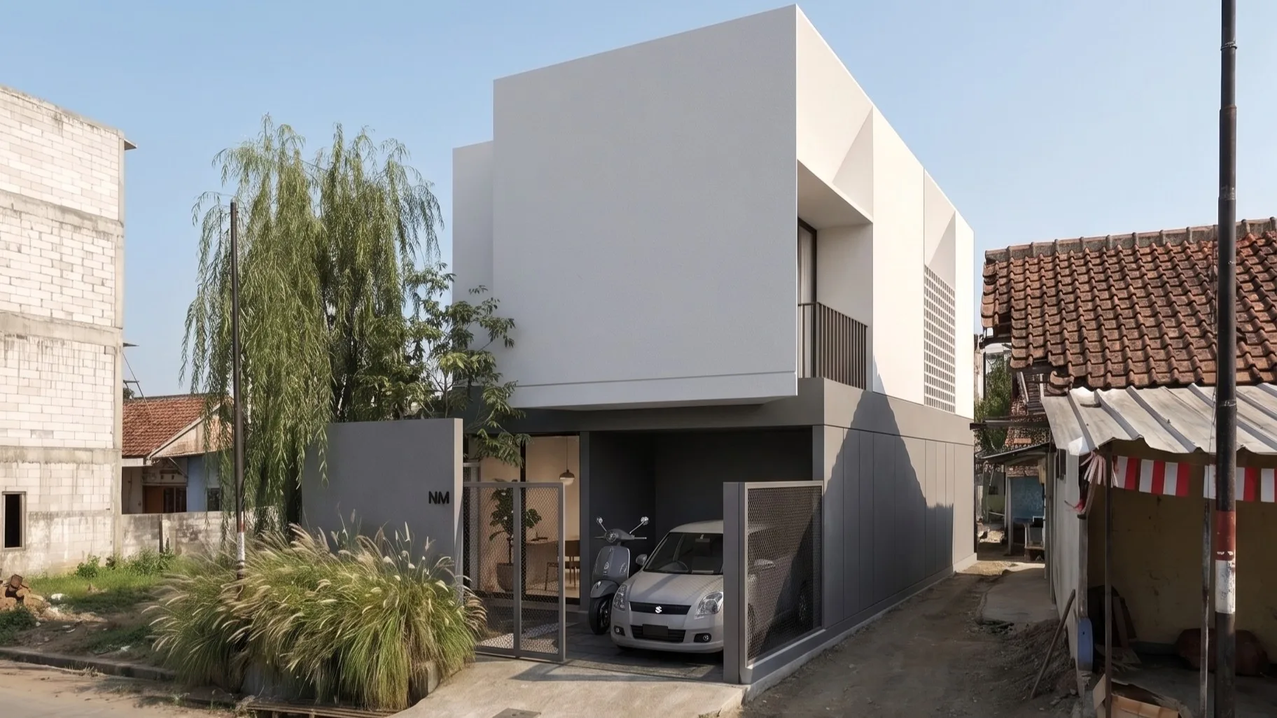 NM House's white two-storey corner facade by day, a car and scooter parked behind the perforated gate.