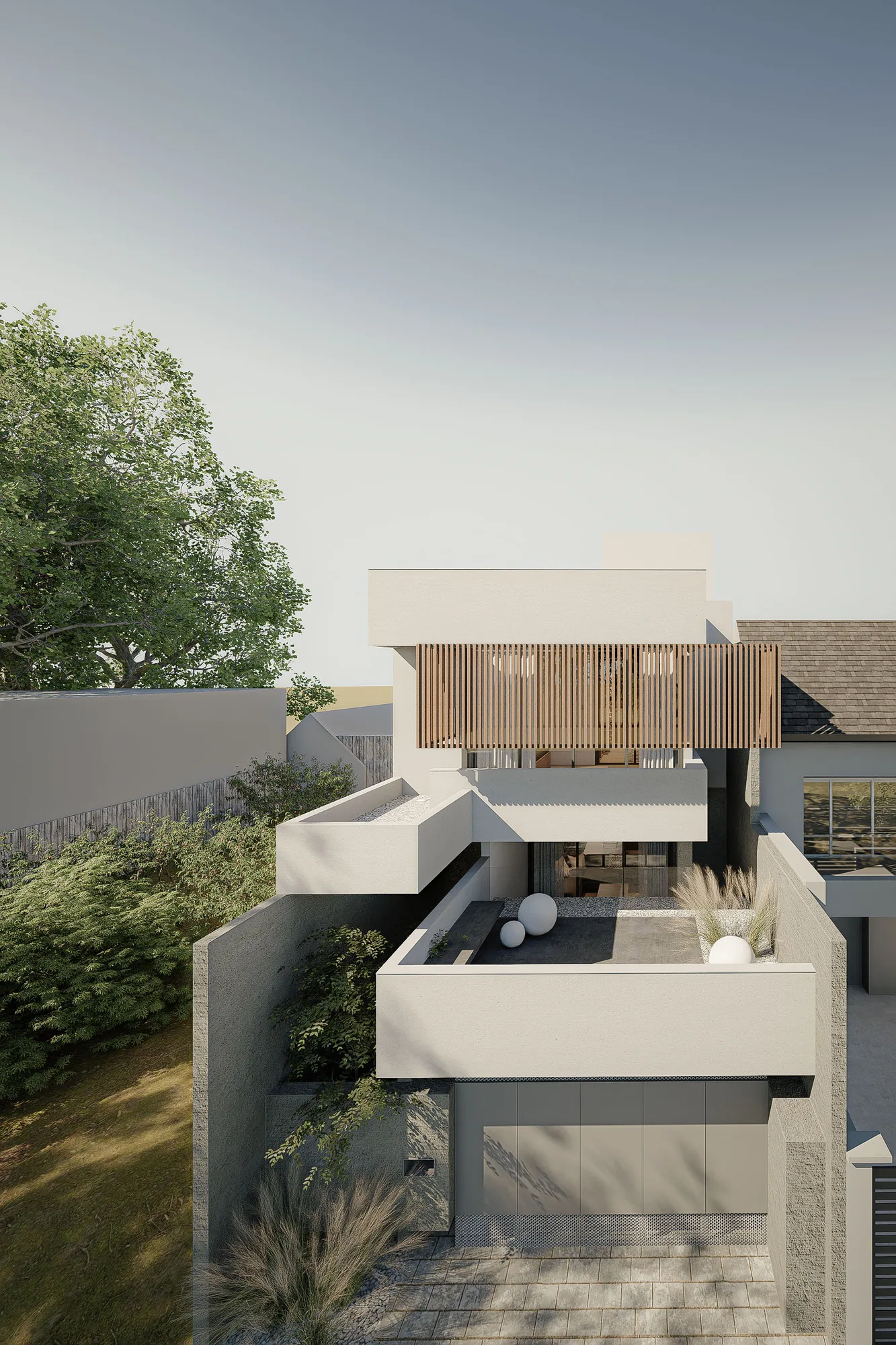 Aerial view of Rumah Seiman's rooftop terrace with a reflecting pool and ornamental grasses.
