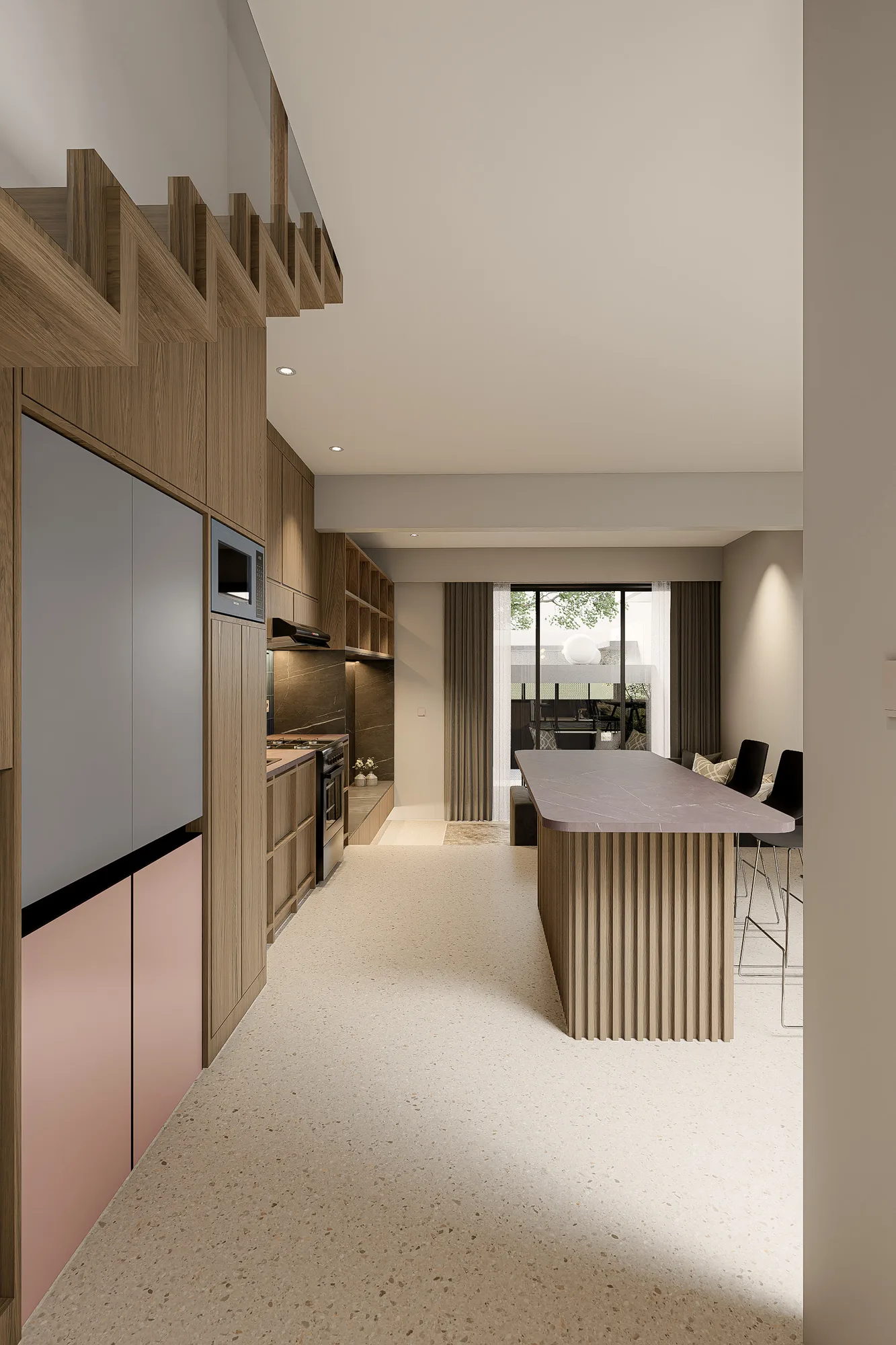 Kitchen corridor with a blush-panelled refrigerator, timber cabinetry, and a fluted island beyond.