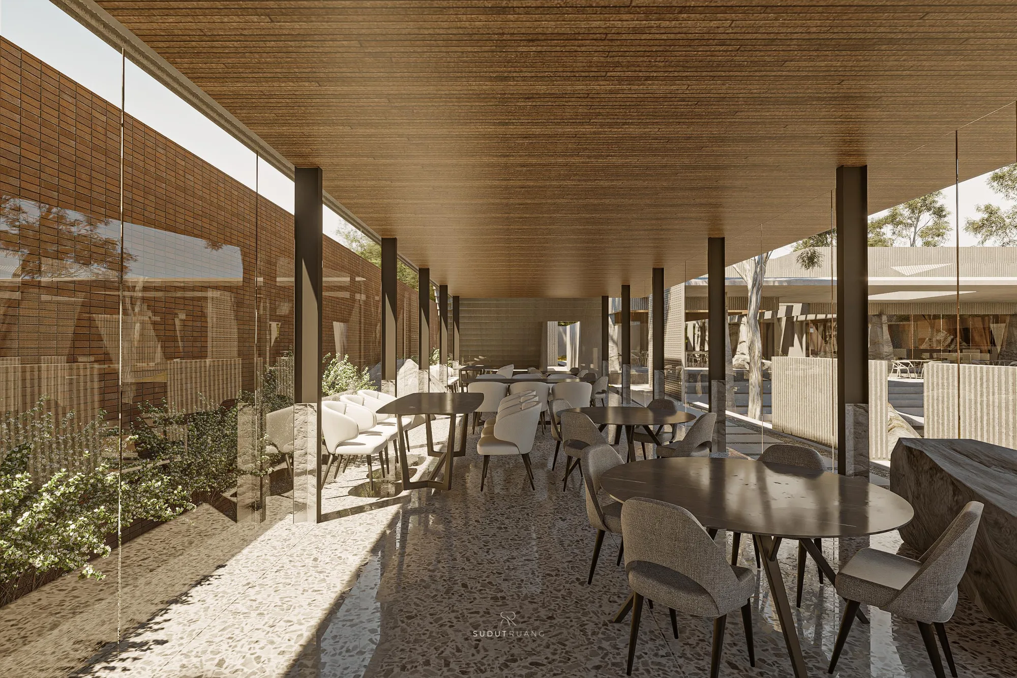 The covered walkway's dark columns and glass reflections stretching toward the dining terrace at sunset.