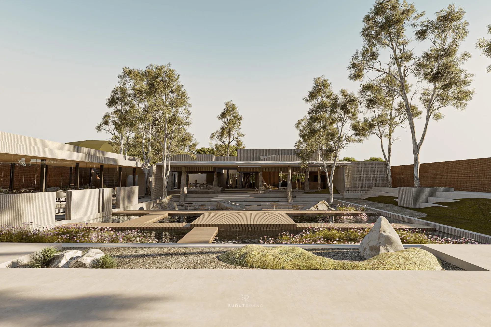 The central axis running from the reflecting pools to the stepped seating, trees framing the dining pavilion beyond.