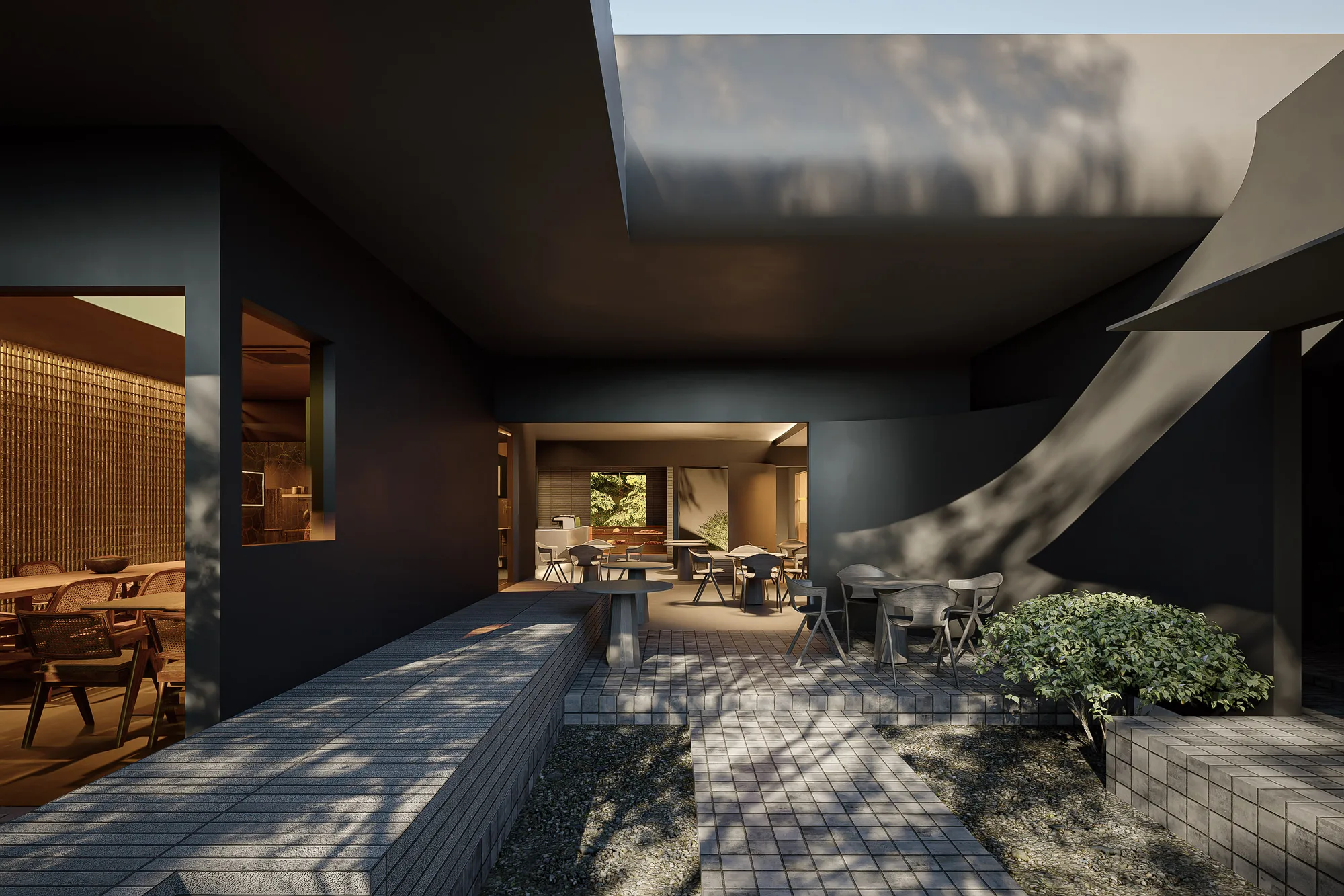 The covered walkway linking the dining room to garden seating, an existing tree trunk running along its ceiling.