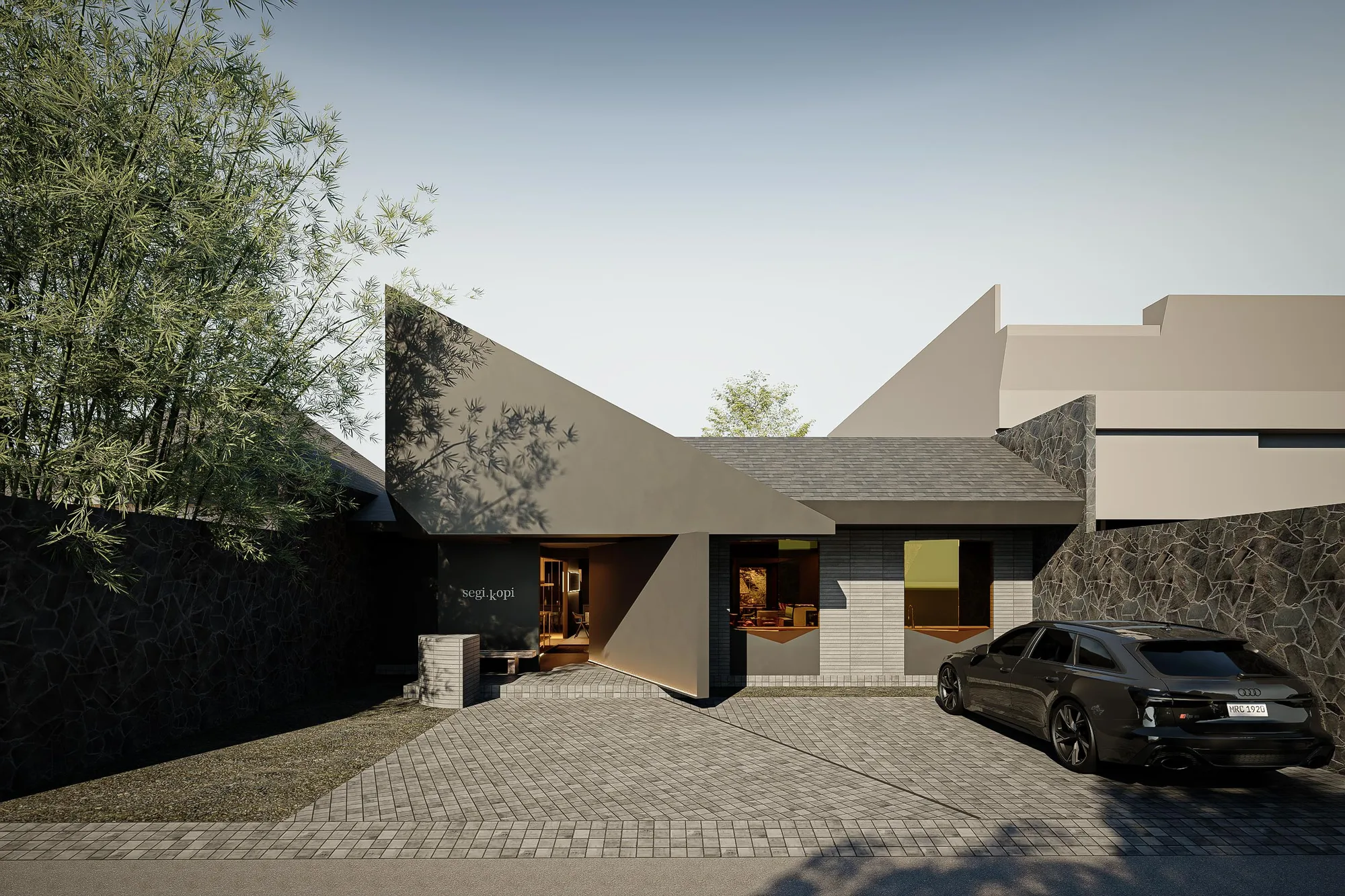 Street view of the entrance, angled black roof planes meeting a stone boundary wall and bamboo trees.