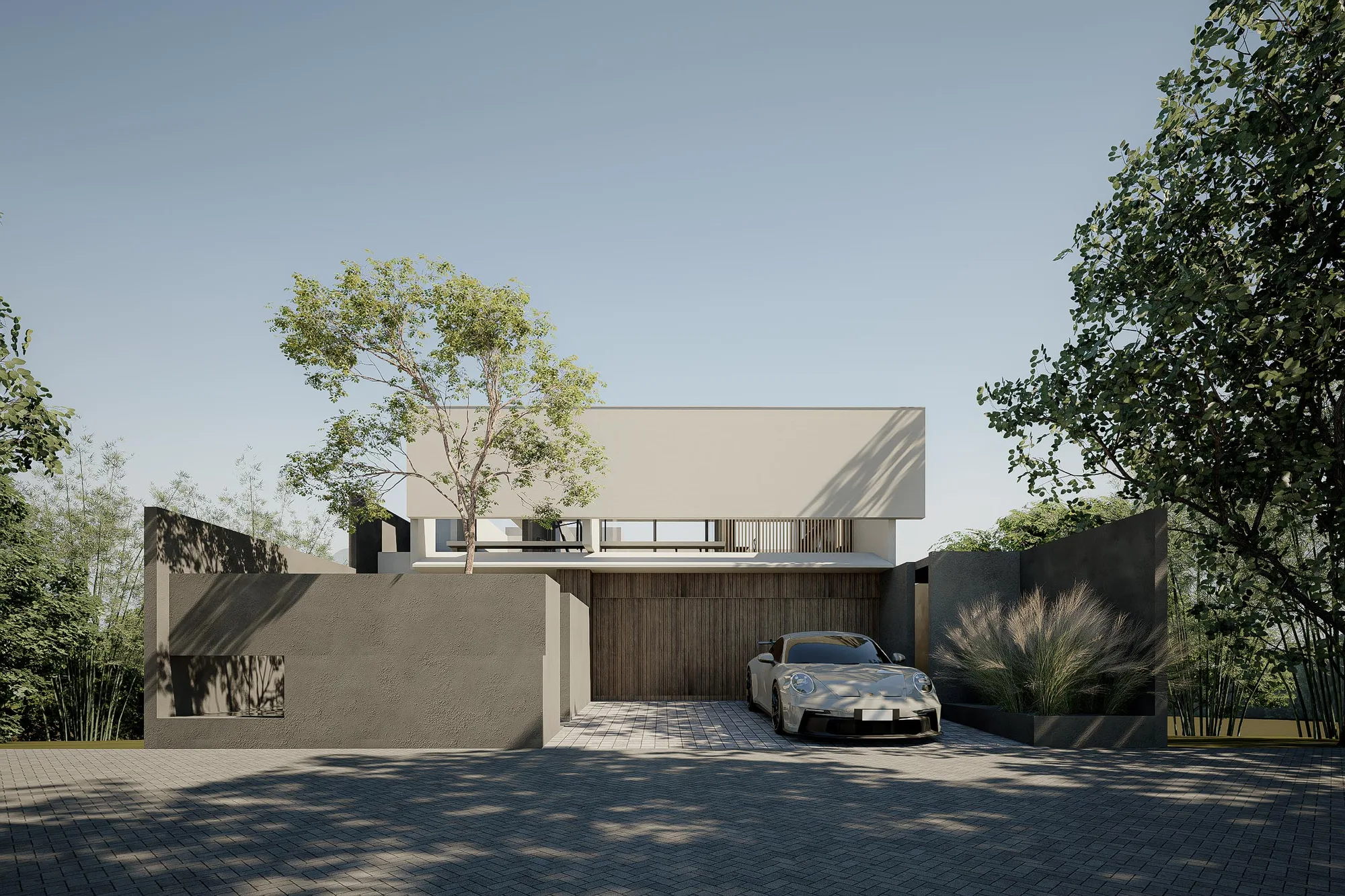 Frontal view of Taut house's stacked concrete volumes, a sports car centred in the paved forecourt between tall trees.