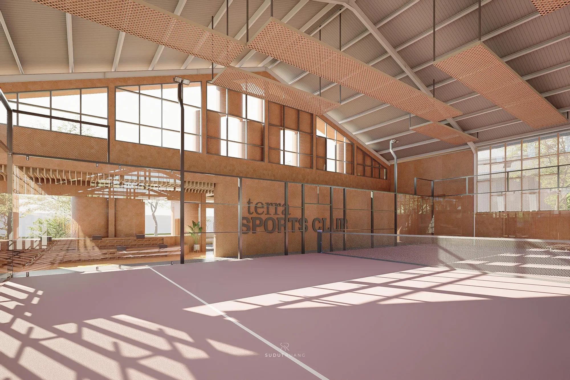 Terra Sports Club's court hall wide shot: tiered spectator seating, chain-link netted courts, and the club's signage cast onto the terracotta wall below the clerestory windows.